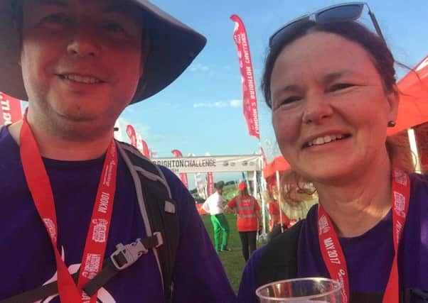 Vanessa and Mike Kennedy at the finish of their London to Brighton trek PHOTO: Supplied