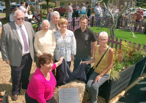 Allen Thwaites, from the Friends of Gretton Court, with special guests who officially opened the new sensory garden at the Melton elderly housing complex EMN-170506-102909001