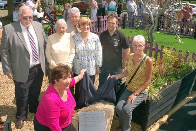 Allen Thwaites, from the Friends of Gretton Court, with special guests who officially opened the new sensory garden at the Melton elderly housing complex EMN-170506-102909001
