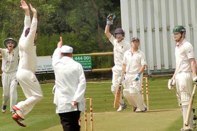 Nick Watchorn takes to the air after trapping Rich Randall lbw EMN-170606-084819002
