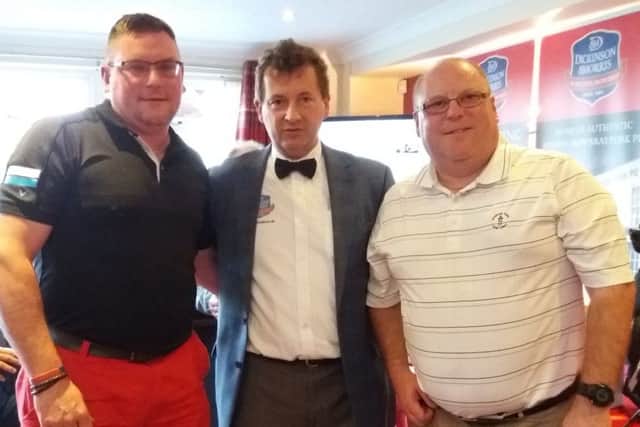 Dickinson and Morris MD Stephen Hallam (cebtre) with winning pair Scott Cartwright and Mike Catlin EMN-170606-162416002