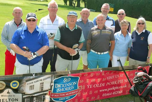 Golfers and officials gather at the first tee for the 22nd Pork Pie EMN-170606-163008002