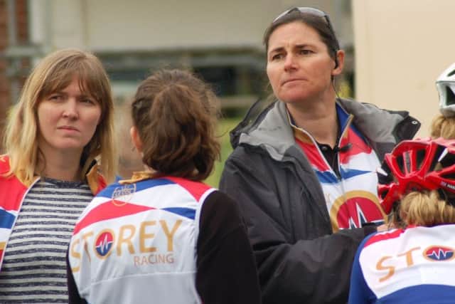 Dame Sarah Storey meets her team at the finish assisted by Melton's former Paralympic swimming gold medalist Emily Jennings (left) EMN-170606-175237002