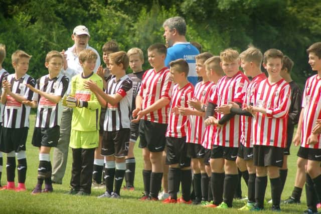 The teams line-up for the National Anthems EMN-170706-160311002