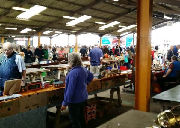 Stallholders in the covered market at Melton Cattle Market EMN-170706-161452001