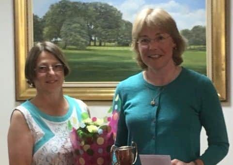 Stoke Rochford ladies' captain Pauline Haggerty with winner Louise Bradley EMN-170613-112043002