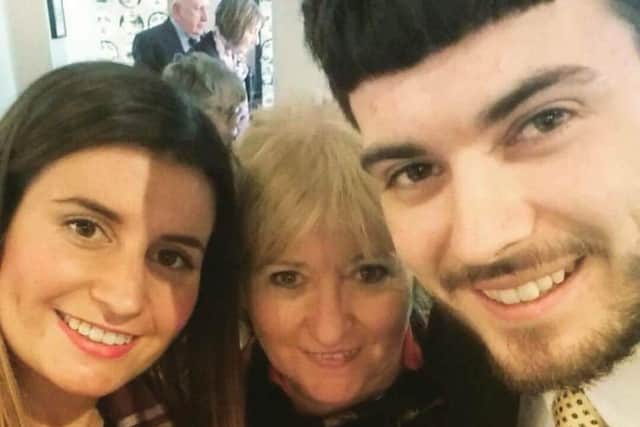 Holly Jones, who survived the London Bridge terrorist attack, with mum Kate and brother Rob EMN-170614-130833001