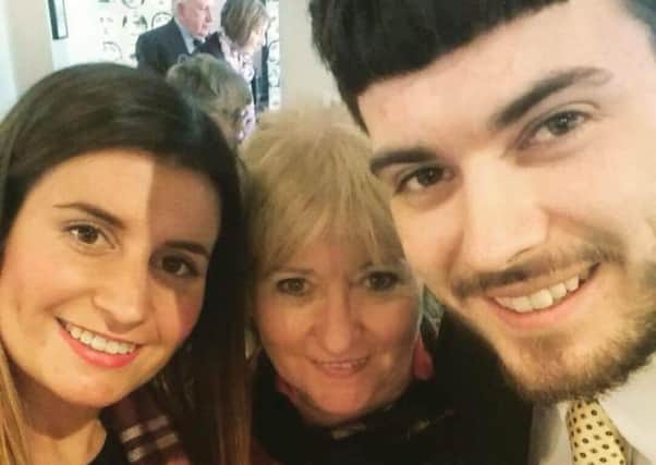 Holly Jones, who survived the London Bridge terrorist attack, with mum Kate and brother Rob EMN-170614-130833001