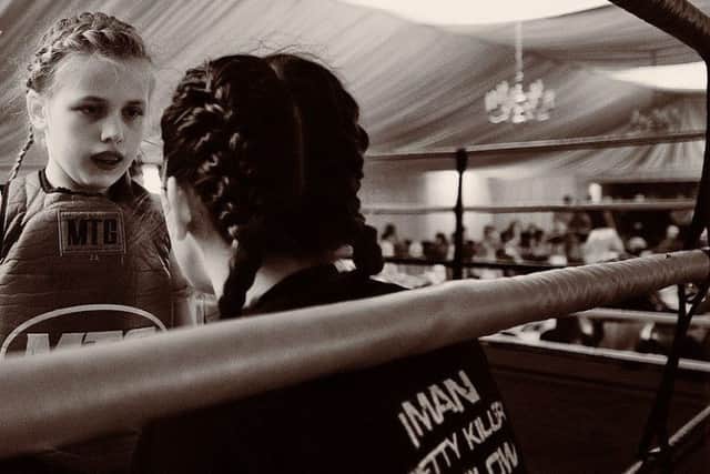Offering some coaching to a young Muay Thai Assassin Picture: Awakening EMN-170615-103538002