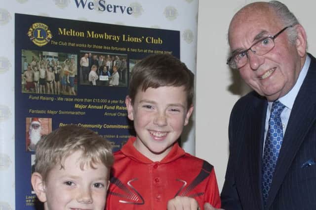 Brothers Jamie and Charlie Neece receiving their Youth Achievement Award from former Melton Mayor councillor David Wright PHOTO: Supplied
