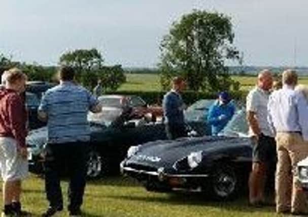 Spectators gathered at Whissendine classic car and motorcycle meet PHOTO: Supplied