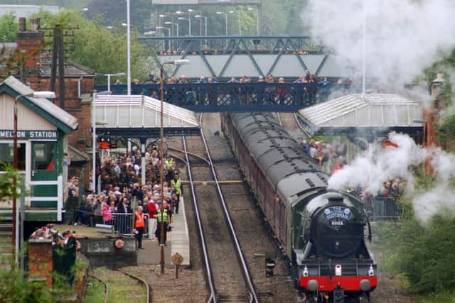 The Flying Scotsman, pictured here from the Dalby Road bridge on a recent visit, is set to pass through Melton Station again on Saturday
PHOTO: Tim Williams EMN-170628-101931001