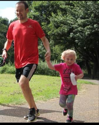 Alanah with dad Ian on her first ParkRun EMN-170629-123336002