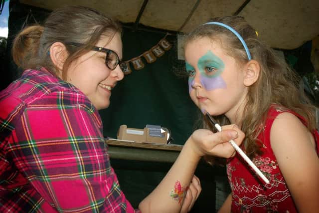 Five-year-old Hazel Ashby takes her face painting session seriously EMN-170407-115516001