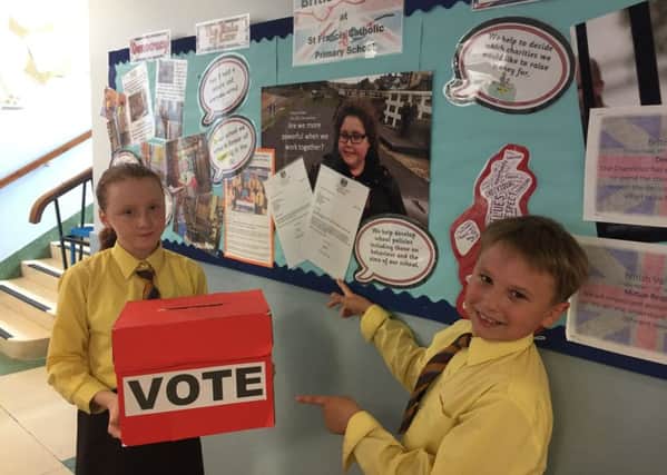 Finlay and Eleanor with the school's letter from the Prime Minister PHOTO: Supplied