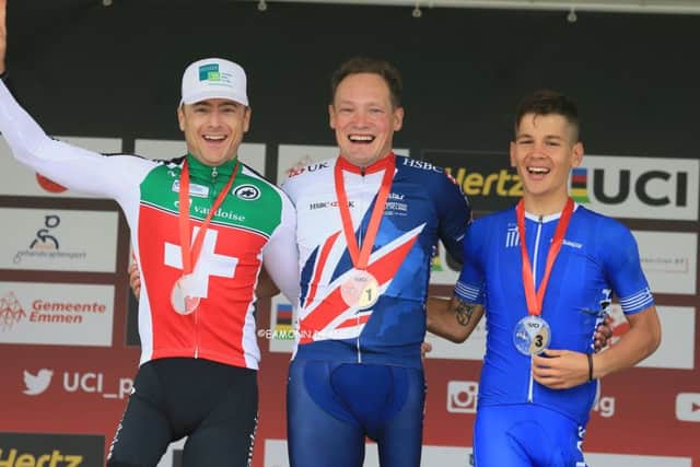 Price is all smiles on the podium with silver medallist Roger Bolliger (left) and Nikolaos Papangelis who won the bronze EMN-170507-112813002