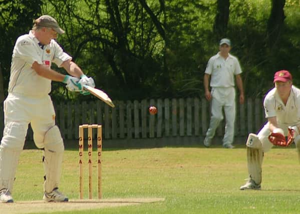 Barkby United batsman John Pook plays and misses as Ashby Carington wicketkeeper Nigel Lewis waits to pounce EMN-171207-091350002