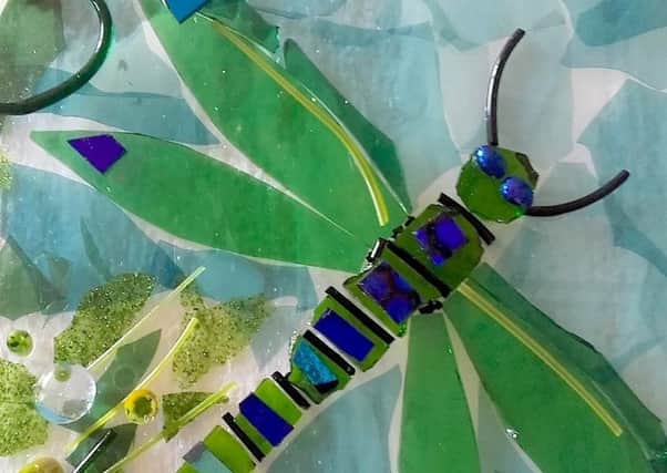 A dragonfly made from fused glass by artist Ali Groschl PHOTO: Supplied