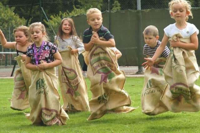 Children taking part in sack races PHOTO: Tim Williams