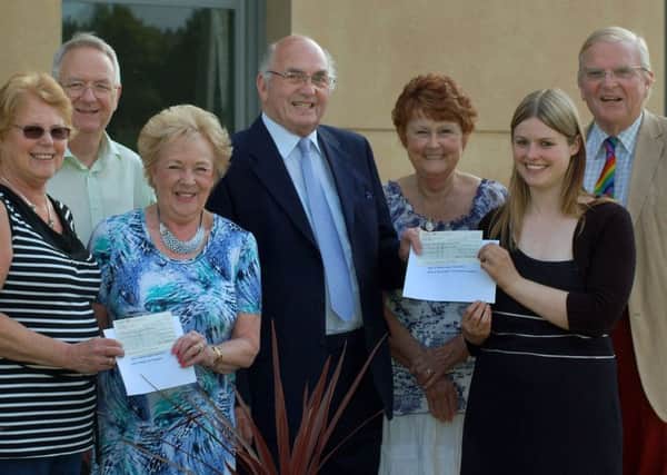 Ina and Peter Scott from Melton Community First Responders, and Val Drake, Jess Dixon and Malise Graham from the Melton and District branch of the Friends of Rainbows Hospice, collect their cheques from last year's Mayor and Mayoress David and Maureen Wright PHOTO: Tim Williams
