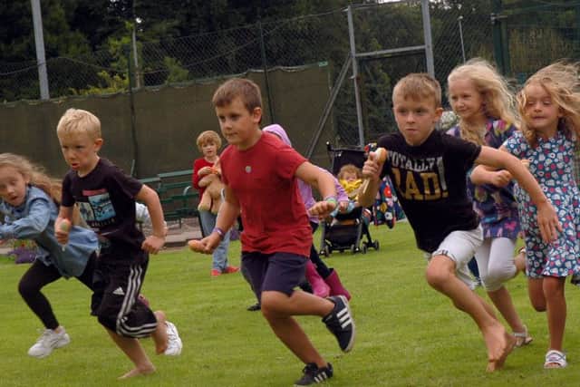 Full speed ahead in the egg and spoon race PHOTO: Tim Williams