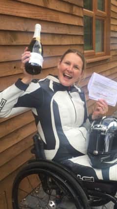 Claire Lomas celebrates attaining her motorbike racing licence EMN-170728-161941001