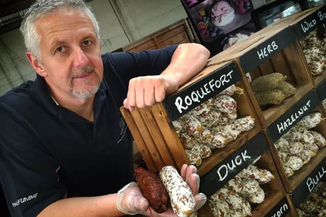 Ian Rowley shows off his stall full of all things with French flavour PHOTO: Tim Williams