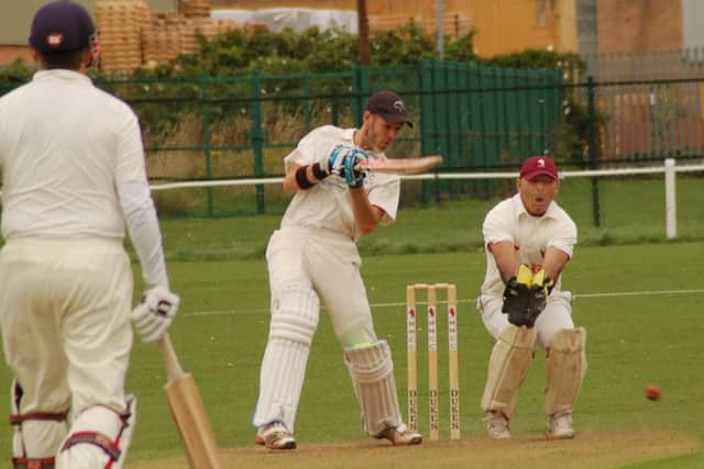 Syston top scorer Chris Pole on his way to a stubborn half-century EMN-170108-102205002