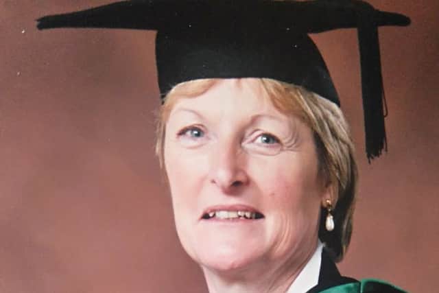 Maureen Ake with her Bachelor of Education (Honours) degree from the University of Roehampton PHOTO: Supplied