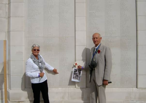 Geoff and Judy Goodson pictured at the memorial wall at the Tyne Cot military cemetery - his father's cousin, Thomas Bernard Goodson, is listed on the wall as one of 34,000 with no known grave after he was killed during the Battle of Passchendaele during the First World War EMN-170908-145905001
