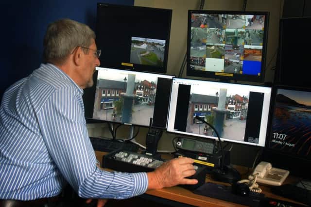 Roger Petchey, lead volunteer for Melton police, monitors live CCTV footage of the town centre streets on his banks of screens EMN-170708-162138001