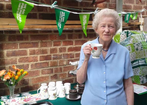 Wendy Robertshaw sips a cuppa for Macmillan Cancer Support PHOTO: Supplied