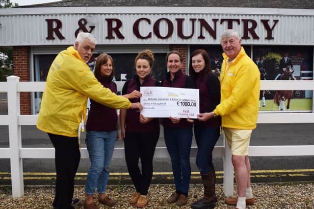 Cheque being donated to Air Ambulance volunteers (left to right): Ian Evans, Gemma Knott, Bryony Allen, Wendy Beal, Sadie Ellis and John Nowell PHOTO: Supplied