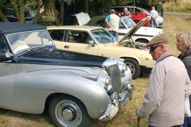Classic cars attract admiring glances PHOTO: Tim Williams EMN-160822-121546001