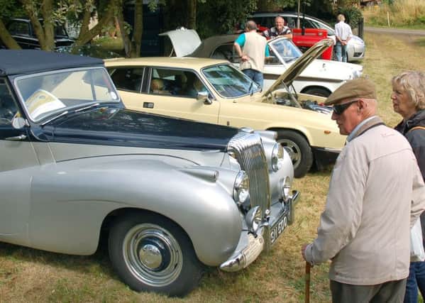 Classic cars attract admiring glances PHOTO: Tim Williams EMN-160822-121546001