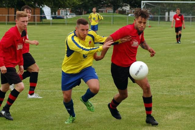 Liam Ambrose in possession for Town