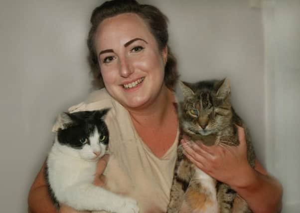 Annaleise Bradley, with her two cats, who has started a new Melton charity from her home, called Annie's Kitty Cavern EMN-171108-171112001
