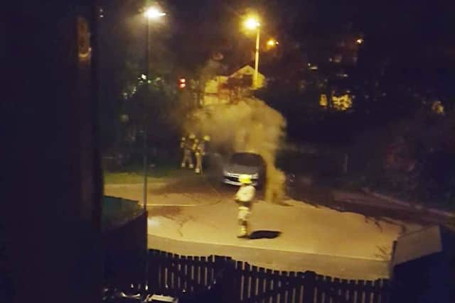 A car on fire in Drummond Walk, Melton, after being attacked by an arsonist. PHOTO by Sarah Criddle EMN-170814-095231001