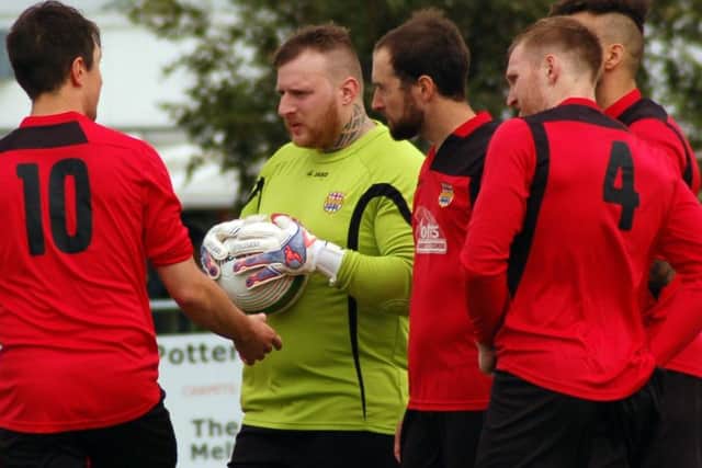 Jamie Witham made his debut after switching from crosstown rivals Holwell Sports EMN-170814-181011002