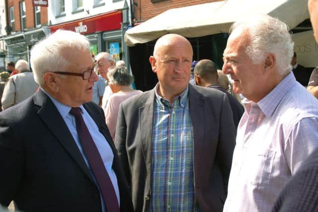 Crime commissioner Lord Willy Bach in Nottingham Street during his 'Melton walkabout' chatting with local village councillor Alan Batten EMN-170815-160641001