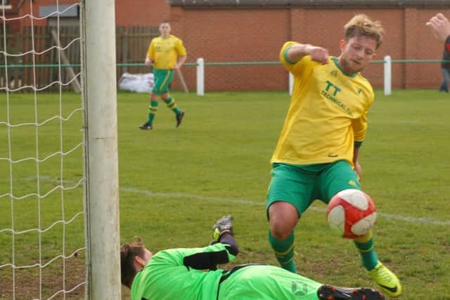 Kieran Foster's looping cross gave Holwell an early lead, but he was given a few headaches in defence EMN-170816-091124002
