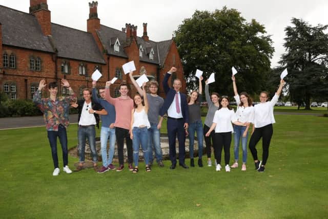 Racliffe College A-level students celebrate their results EMN-170817-125744001