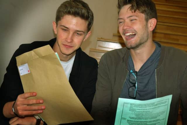 Twins George and Benjamin Wilkinson celebrate their A-level results at MV16 EMN-170817-140956001