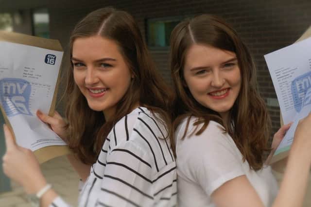 Twins Sophie and Hannah Pilsworth with their A-level results at MV16 EMN-170817-141052001