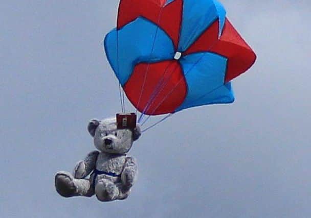 A Teddy bear parachutes in Somerby to raise money for the stone memorial to Second World War paras.
PHOTO Melanie Davies EMN-170913-143630001