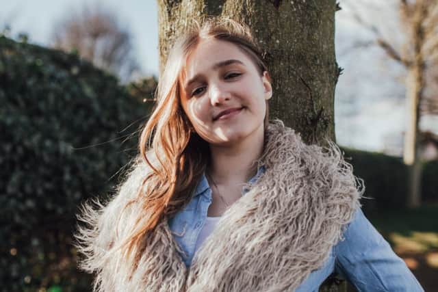 Schoolgirl singing talent Eva Finnemore who is fundraising for her music hero and teacher Howard Rose, a finalist in the 2015 TV series of The Voice EMN-171209-155741001