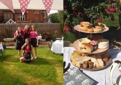 The girls and their cakes in the back garden at 65 Burton Road PHOTO: Supplied