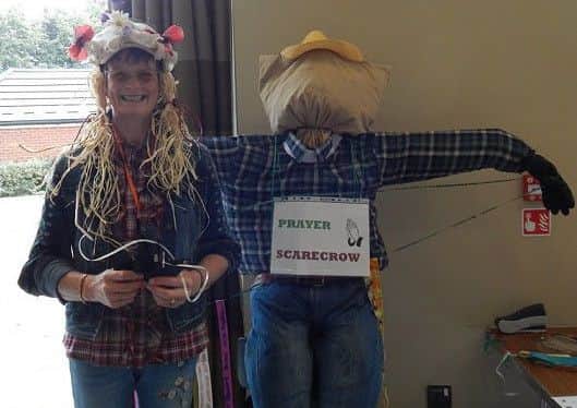 The Rev Debbie Starling made a new friend in the creative prayer corner which was run by Linda Pearson PHOTO: Supplied