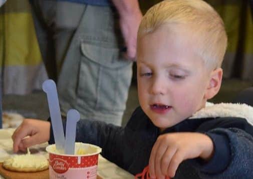 Decorating scarecrow biscuits proved popular with the children who attended PHOTO: Supplied