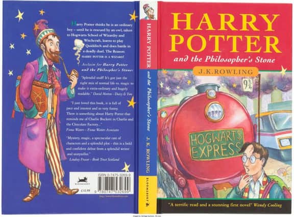 A rare, first-edition Harry Potter book sold at auction for a record-breaking £60,000 - more than 5,000 times its original £10.99 price tag. SWNS